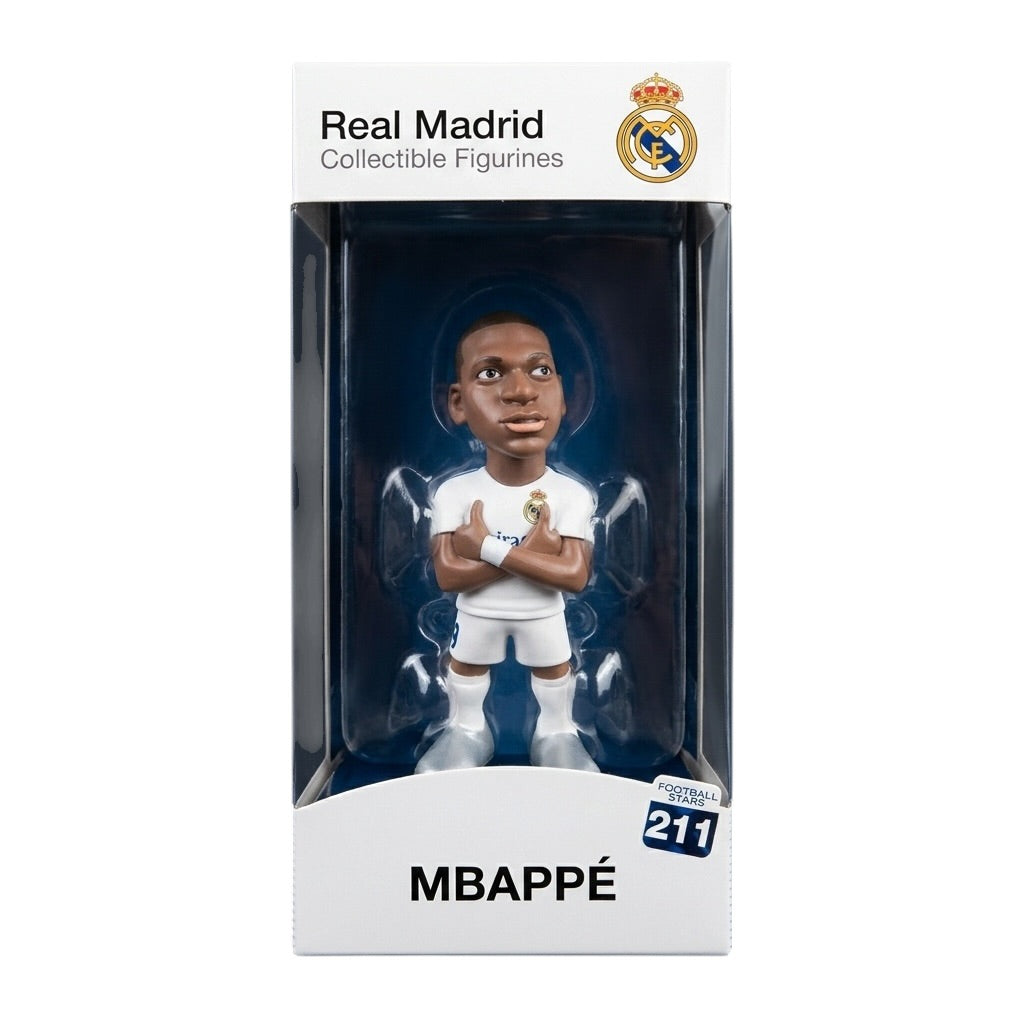 Collectible figurine of a soccer player in packaging with Real Madrid branding